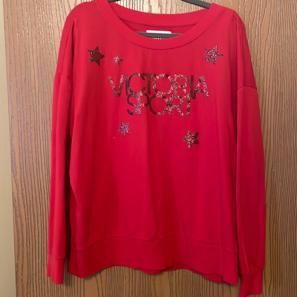 Victoria’s Secret red sweatshirt